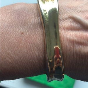 Gold tone square bangle-type bracelet